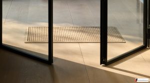 Beige dørmatte -foto