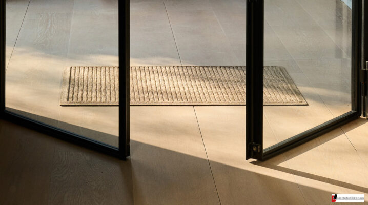 Beige dørmatte -foto